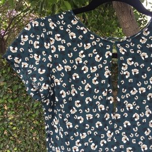 Dark green floral print romper with keyhole cutout